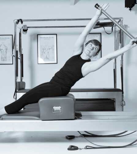 Reformer with side-lying stretch